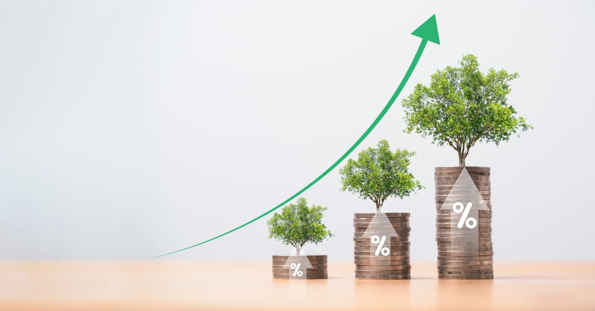 Trees grow on stacks of coins that increase in height to the right, with a green upward arrow above them.